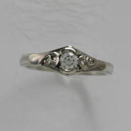 R317 Diamond set Koru band in White Gold